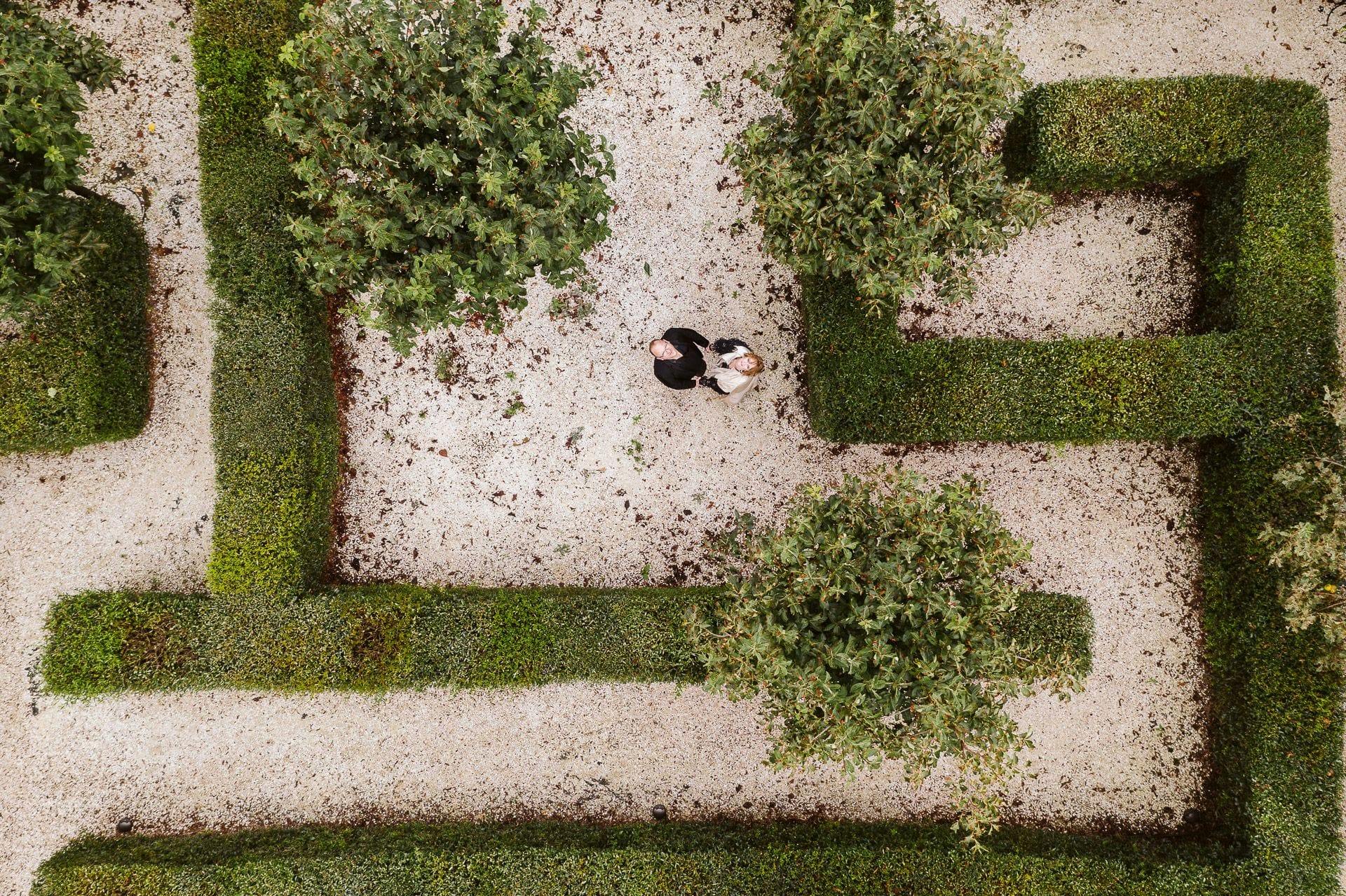 A couple in a maze seen from above